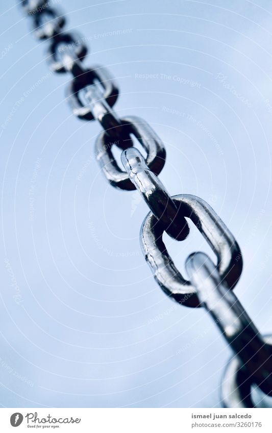 metallic chain and blue sky Iron chain Metal Steel link Industrial Strong Power Safety (feeling of) Industry linked Connection Object photography Abstract