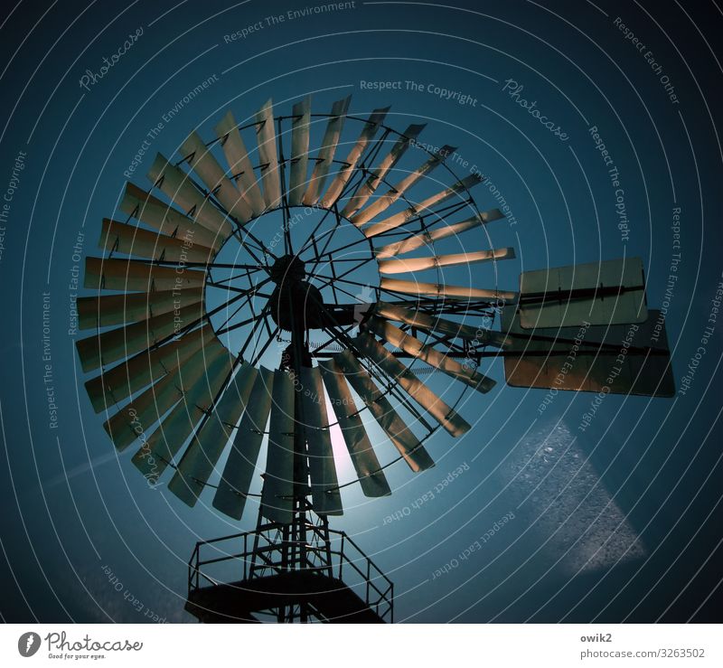 twister Technology Energy industry Wind energy plant Pinwheel Cloudless sky Sun Beautiful weather Metal Movement Rotate Illuminate Old Exceptional Gigantic