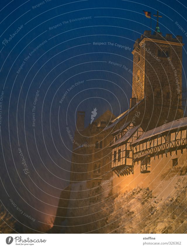 snow flurries Castle Cold Snowfall Wartburg castle Half-timbered facade Tower Winter Colour photo Copy Space left Copy Space top