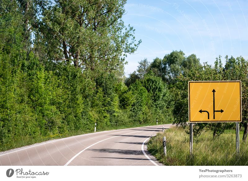 Empty road and street sign with direction arrows. Crossroad sign Vacation & Travel Trip Summer Nature Beautiful weather Tree Transport Traffic infrastructure