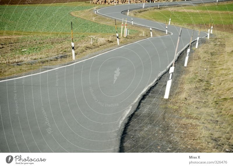 Curvy Transport Traffic infrastructure Street Moody Dangerous Threat Lanes & trails Haste Curve Road safety Colour photo Exterior shot Deserted