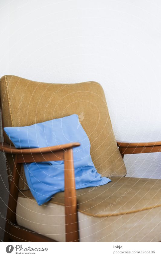 old armchair with light blue cushion Colour photo Interior shot Detail Close-up Armchair Designer furniture Cushion Deserted Copy Space Brown Beige White