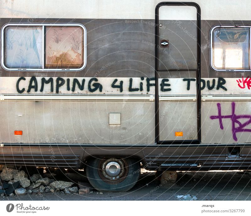 Camper | Written Leisure and hobbies Vacation & Travel Camping Mobile home Caravan Characters Graffiti Exceptional Joy Passion Life Colour photo Exterior shot