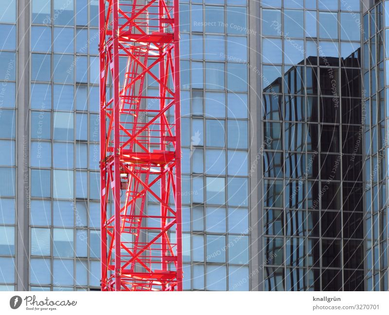 construction site House (Residential Structure) High-rise Facade Window Work and employment Glittering Tall Town Blue Red Growth Living or residing