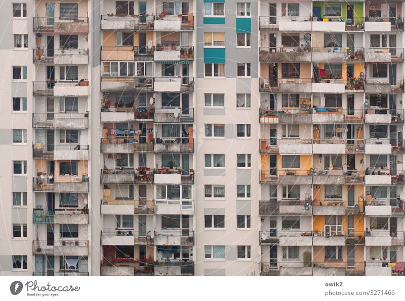 affluent society Living or residing Flat (apartment) Poland Town High-rise Building Wall (barrier) Wall (building) Facade Balcony Window Concrete Glass Metal