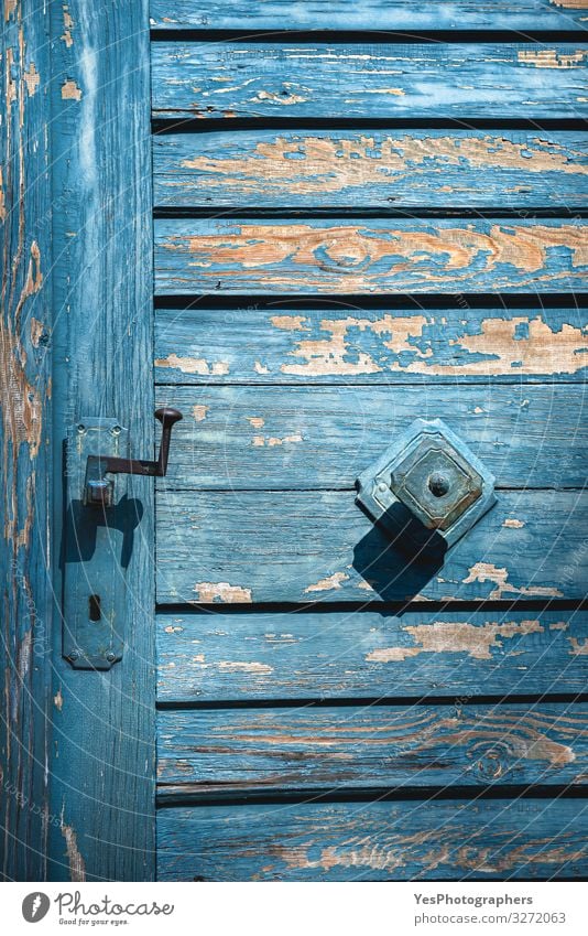 Antique blue door close-up. Doorknobs and aged wooden door. Architecture Facade Wood Old Retro Tradition Germany Ancient architecture details background