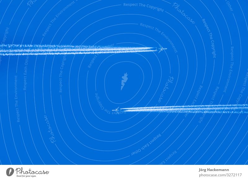 sky with condensation trail of two aircrafts passing each other Harmonious Vacation & Travel Sky Horizon Transport Aircraft Soft Blue Cold Jet acars background