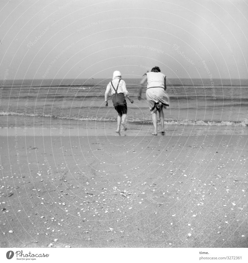 Stiff breeze Ocean windy Summer seashells Waves vacation Life Walking in common at the same time Horizon Sand Beach Coast holidays Analog B/W black-and-white