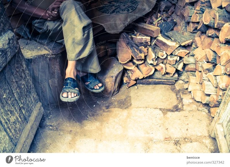 wooden legs Feet Legs Wood Firewood House (Residential Structure) Man Human being Poverty India slippers Sandal Flip-flops Sit Asia Hut small house