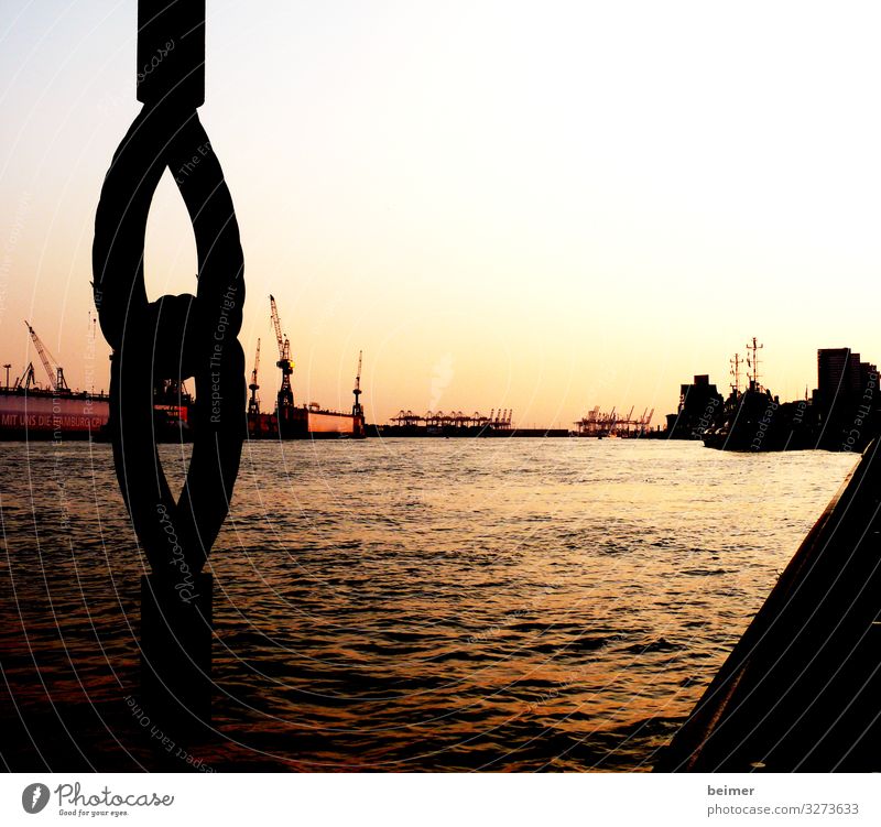 My pearl Water Cloudless sky Sunrise Sunset Port of Hamburg Port City Deserted Harbour Tourist Attraction Steel Kitsch Gold Orange Black Moody Warm-heartedness
