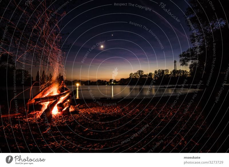 Bonfire in a summer night at the river 2 Fire Coast Lakeside River bank Hot Sunset Camp fire atmosphere Fireplace Nature Colour photo Subdued colour Deserted