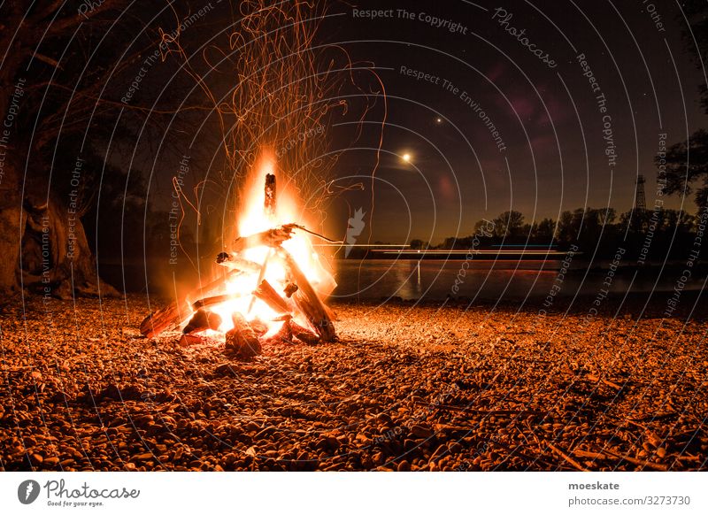 Bonfire on a summer night by the river Spring Summer Coast Lakeside River bank Beach Hot Fireplace Camp fire atmosphere Nature Night Summer night Colour photo