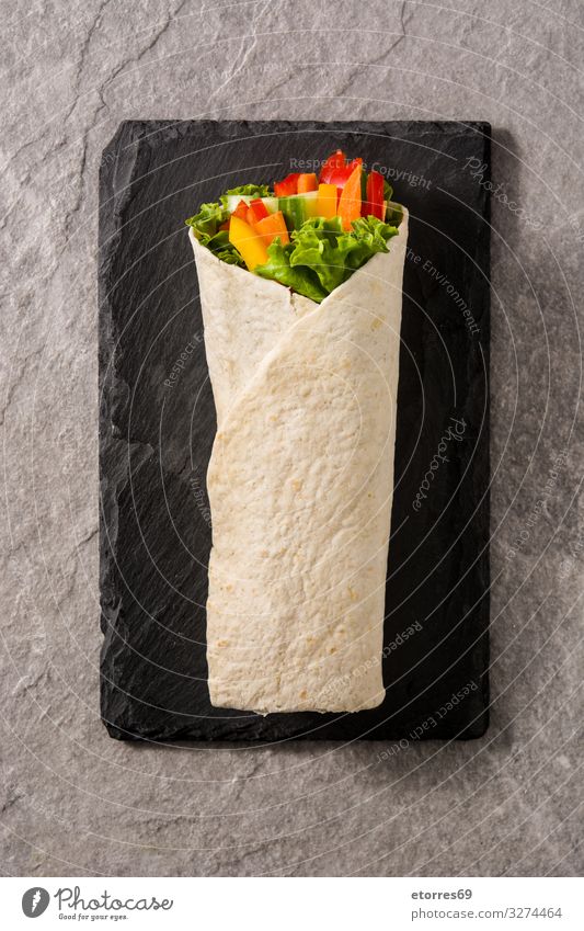 Vegetable tortilla wraps on gray stone background. Top view Wrap Roll Flat bread Food Healthy Eating Food photograph Spring Vegetarian diet Mix Carrot Lettuce