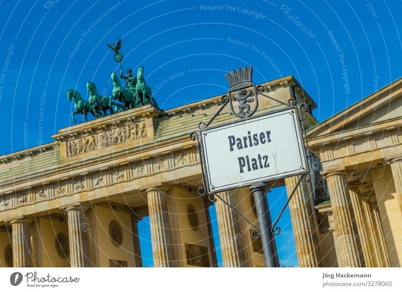 street sign Parisien Place at the Brandenburg gate Vacation & Travel Places Historic Tall Berlin Gate Goal architecture blue building capital City Europe German