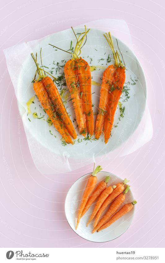 Delicious roasted carrots from above Vegetable Herbs and spices Lunch Dinner Vegetarian diet Diet Healthy Eating Fresh Natural Above Orange Pink Carrot