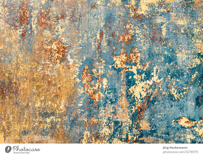 old grunge wall of an old house with remainings of color Wallpaper Stone Old Dirty Retro Strong Antique background brick Cement chipped Rough Crack & Rip & Tear