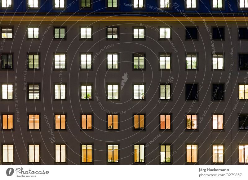 illuminated windows in a facade of a government building Harmonious Work and employment Office Building Architecture Facade Esthetic Moody Trade Safety light