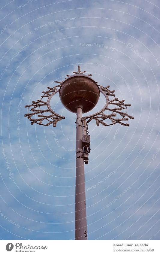 street lamp and blue sky on the street Street lamp Street lighting Lamp post Lighting Illumination lighting equipment City Metal Object photography