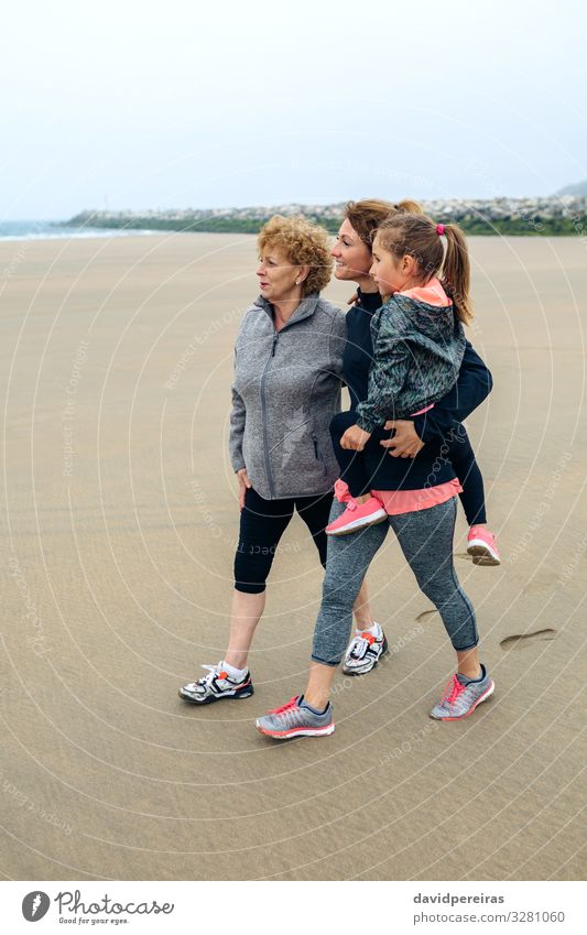 Three generations female looking at sea Lifestyle Joy Happy Beautiful Beach Ocean Child Human being Woman Adults Mother Grandmother Family & Relations