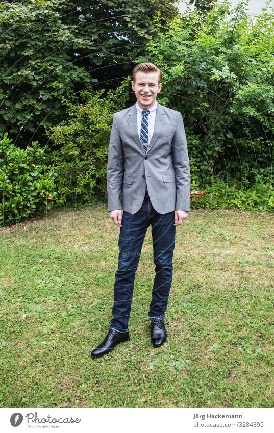 Male Model In A Suit Posing Outdoors Stock Photo, Picture and Royalty Free  Image. Image 75896666.