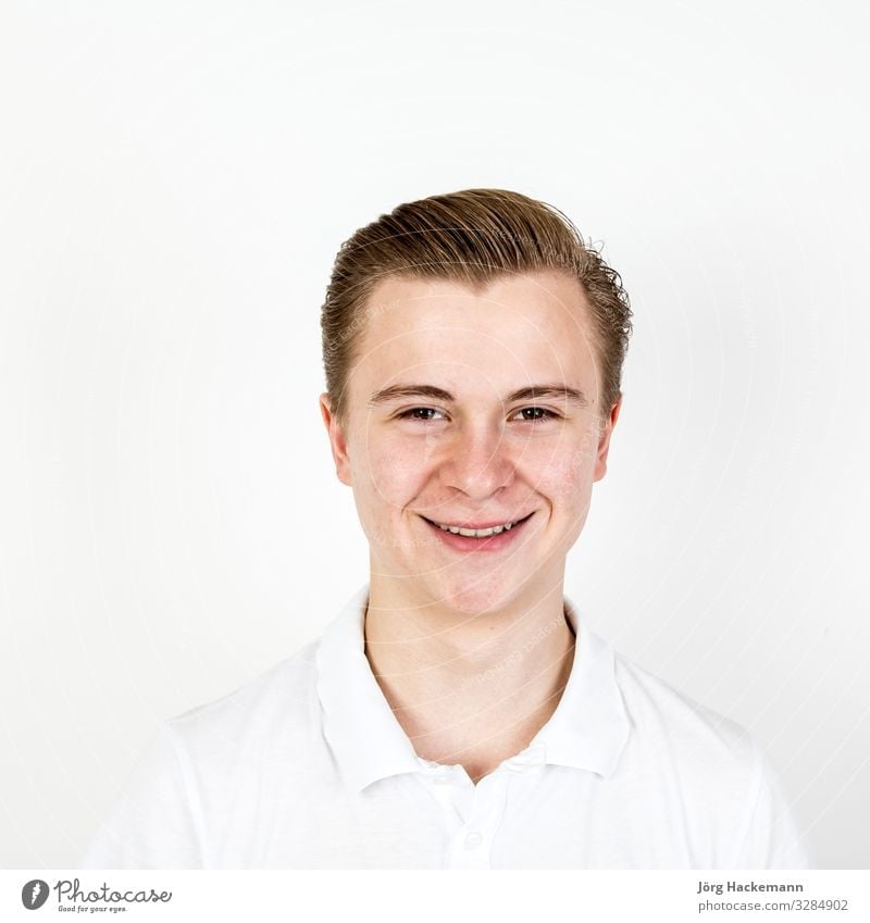 cute sixteen year old boy in studio Joy Happy Beautiful Face Human being Boy (child) Man Adults Youth (Young adults) Smiling Laughter Happiness Cute White