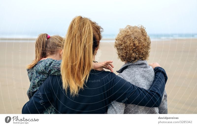 Back view of three generations female looking at sea Lifestyle Joy Happy Beautiful Beach Ocean Child Human being Woman Adults Mother Grandfather Grandmother