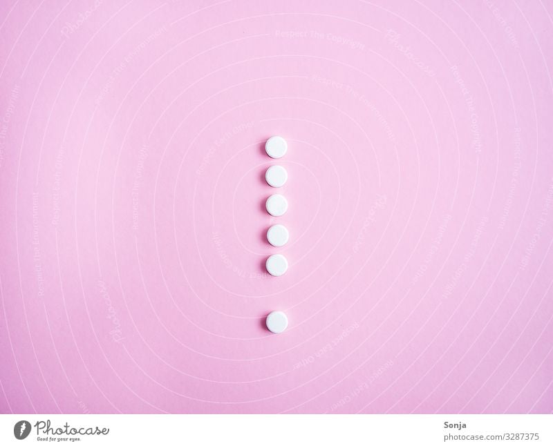 Exclamation mark of white tablets on a pink background Healthy Health care Medical treatment Illness Intoxicant Medication Sign Characters Diet Threat Concern