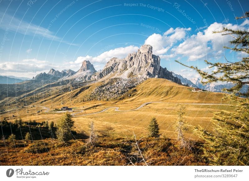 Passo di giau south tyrol Mountain Clouds Landscape Light mountains Evening Sun Nature Blue Grass Street Sky Meadow Exterior shot pass road Church Green Summer