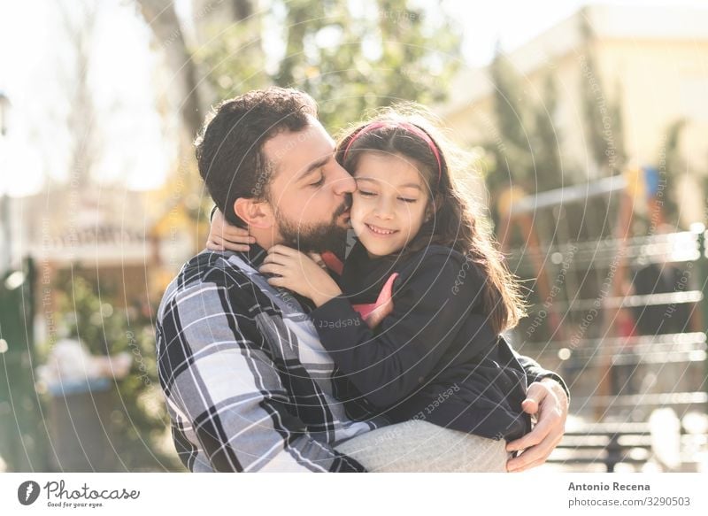 Fathers day Lifestyle Child Human being Man Adults Parents Family & Relations Park Beard Kissing Smiling Love Embrace Daughter embracing bearded