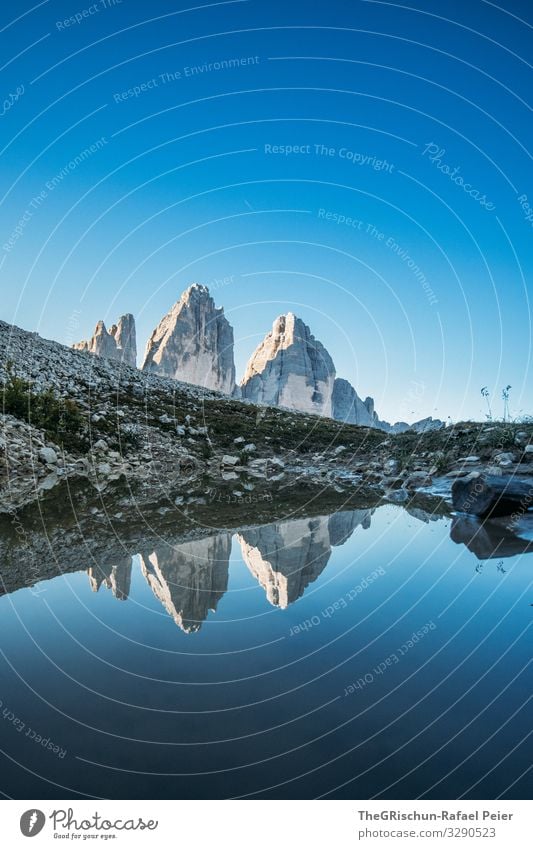 Tre Cime di Lavaredo - Mountains reflected in the small lake Lake Water Calm Hiking popular Tourism Climbing touristic reflection South Tyrol Blue sky