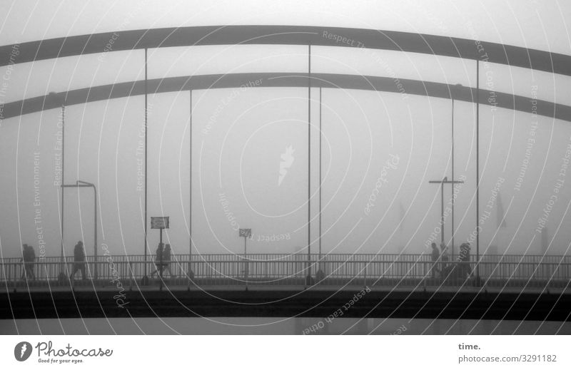 Fog brake | has something to do with farsighted Human being Bridge Bridge railing Lanes & trails Steel Signs and labeling Movement Going Dark Cold Maritime Town