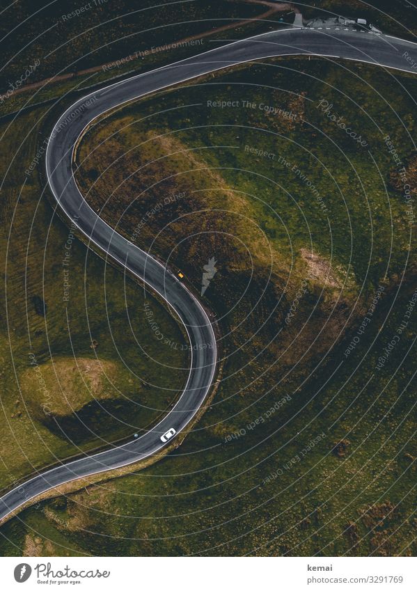 S-curve: road with car from above Landscape Street Meadow Transport Car Road traffic Green Motoring Bird's-eye view droning Curve tranquillity Idyll England