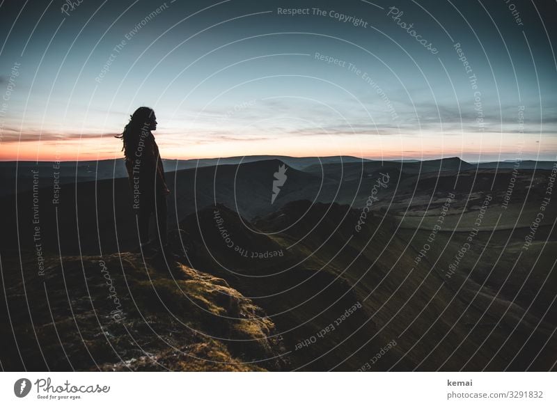 Woman on hill shortly after sunset, looking into the distance Lifestyle Harmonious Well-being Contentment Senses Relaxation Calm Leisure and hobbies Adventure