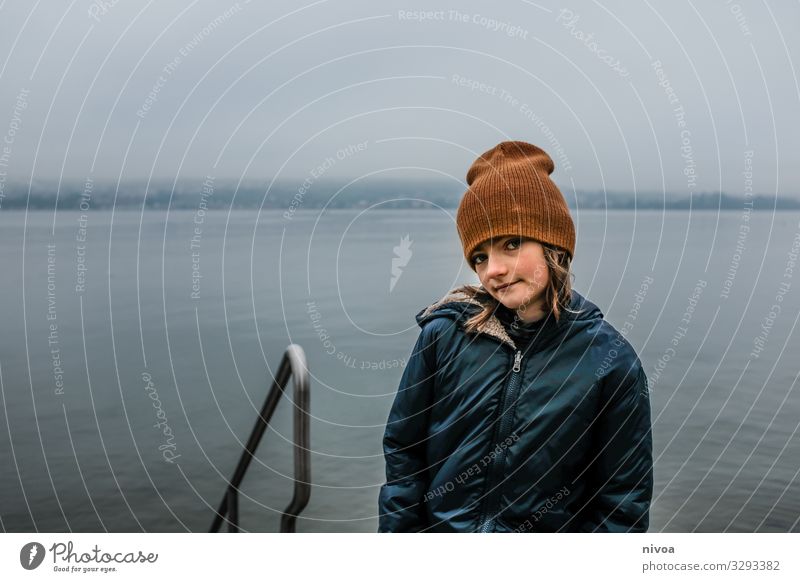 Boy at the lakeside in winter Fish Trip Freedom Winter Aquatics Human being Masculine Child Boy (child) Infancy 1 8 - 13 years Environment Nature Landscape Sky