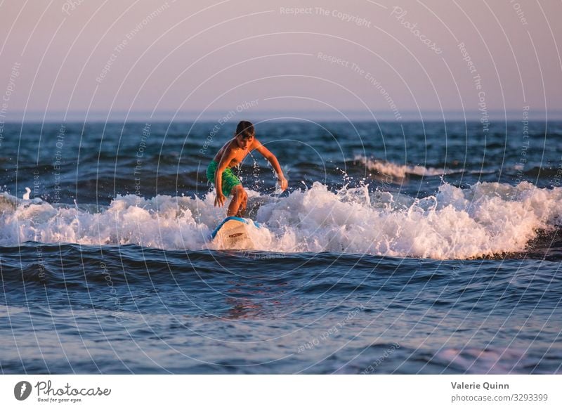 Learning to Surf Surfing Vacation & Travel Summer Summer vacation Beach Ocean Waves Surfboard Boy (child) 1 Human being 8 - 13 years Child Infancy