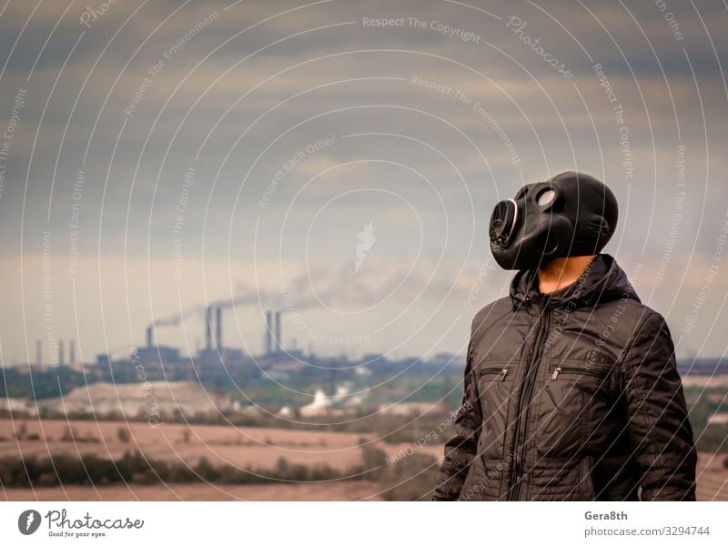 man in a gas mask amid smoke from factory pipes Factory Industry Human being Man Adults Environment Nature Landscape Plant Sky Clouds Tree Clothing Threat Dirty