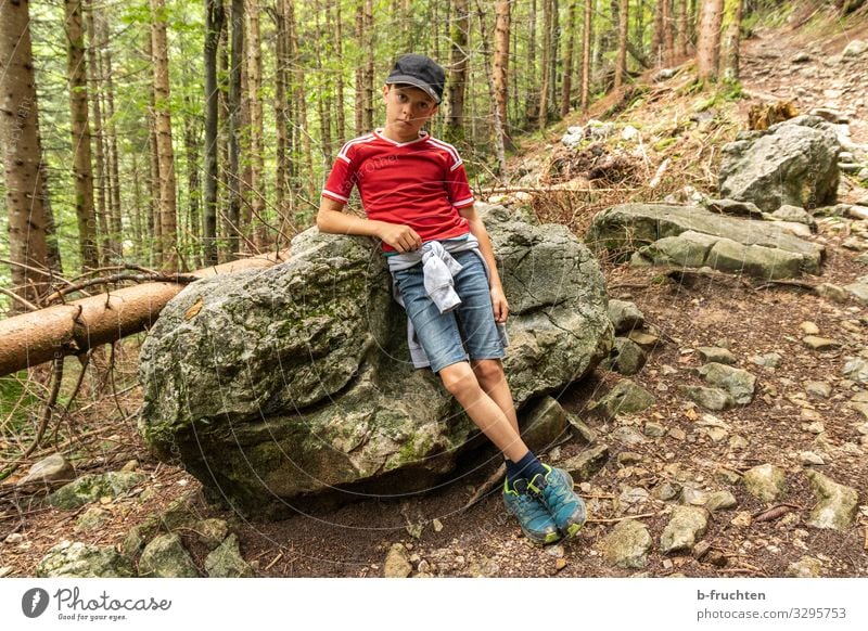 leaving the child against a stone Life Well-being Calm Leisure and hobbies Playing Vacation & Travel Trip Adventure Summer Mountain Hiking Child Boy (child) 1