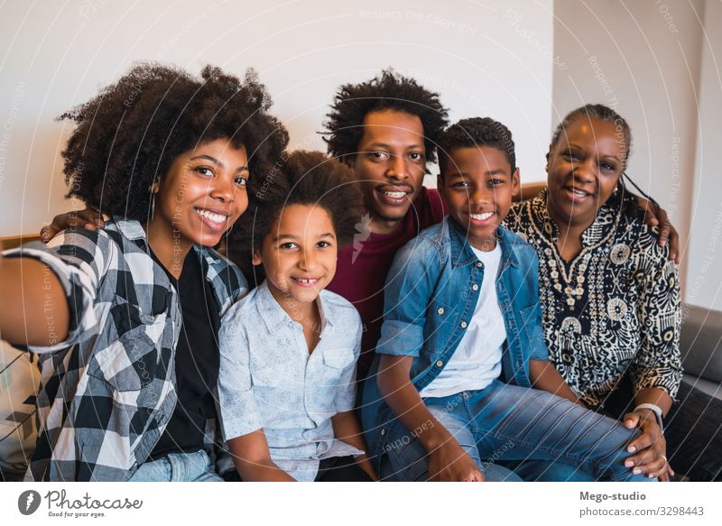 Portrait of african american multigenerational family taking a selfie together at home. Family and lifestyle concept. Lifestyle Joy Happy