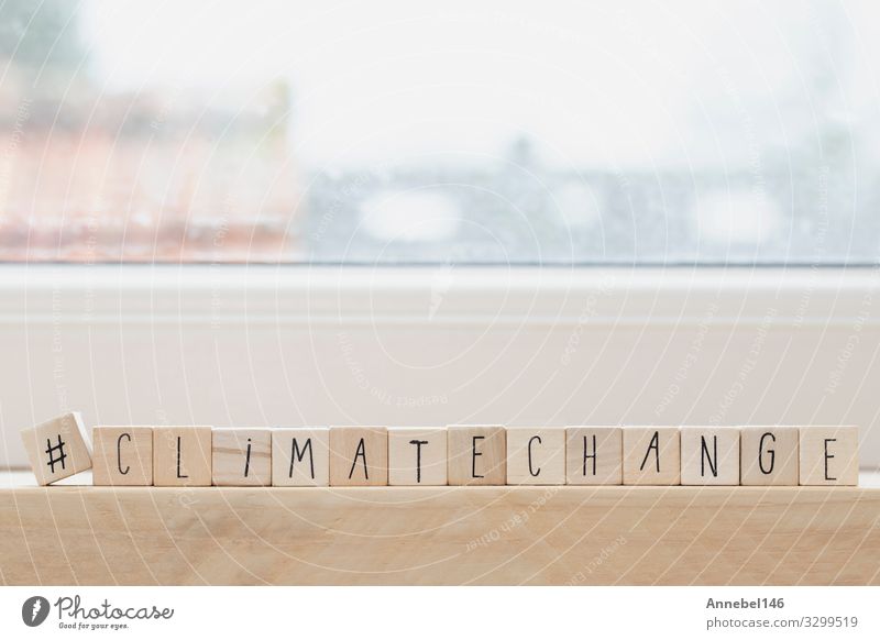 Wooden cubes with a Hashtag and the word Climate Change, Design Business Environment Nature Earth Climate change Globe Hot Blue Green White Conceptual design