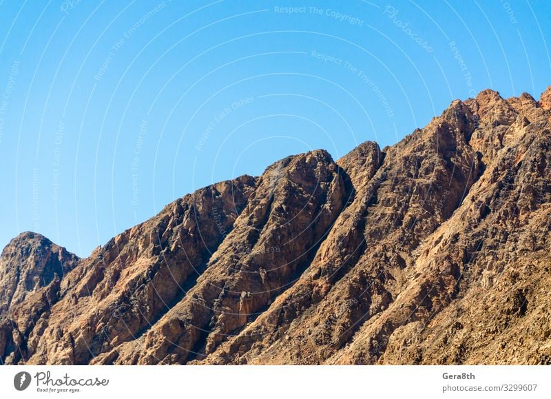 peaks of high rocky mountains against a blue sky in Egypt Vacation & Travel Summer Mountain Nature Landscape Sky Rock Peak Blue background Height high mountains