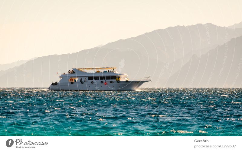 big boat on the background of high mountains in Egypt Dahab Relaxation Vacation & Travel Tourism Cruise Summer Ocean Waves Mountain Nature Landscape Warmth