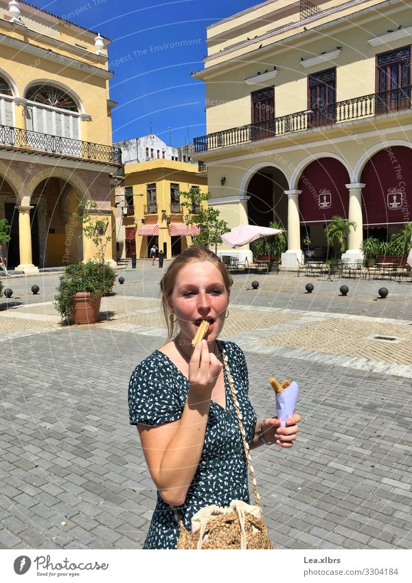 Snacking in Havana Candy City trip Feminine Young woman Youth (Young adults) 1 Human being 18 - 30 years Adults Summer Beautiful weather Cuba Capital city