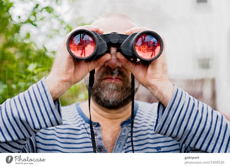 Man looks through binoculars into the distance Human being Masculine Adults Observe Discover Expectation Inspiration Problem solving Curiosity Perspective