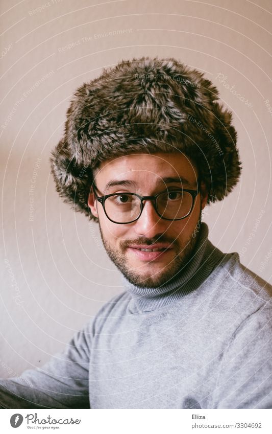 Skeptical honey cake horse Human being Man Adults 1 18 - 30 years Youth (Young adults) 30 - 45 years Beautiful fur cap Pelt Fur hat Eyeglasses second hand