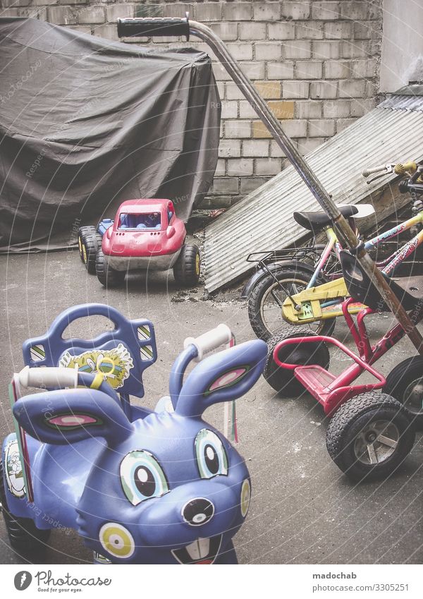 fleet Lifestyle Backyard Transport Means of transport Passenger traffic Cycling Tricycle Poverty Infancy Thrifty Dream Sadness Town Playing Toys Colour photo