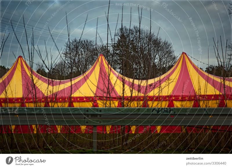 circus tent Domed roof Entertainment Shows Traveling circus Circus Circus tent Circus trailer Tent Tarpaulin Colour Multicoloured Striped Street Crash barrier
