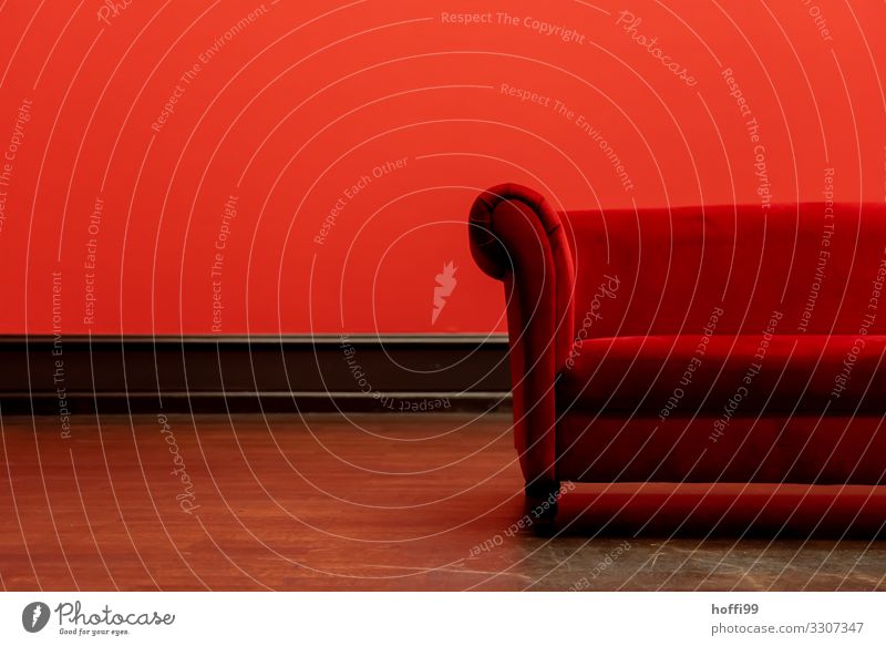 Partial view of a red sofa in a red room Furniture Sofa Living room Exceptional Elegant Uniqueness Retro Warmth Red Black Enthusiasm Warm-heartedness Eroticism