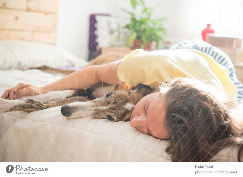 Woman and dog in the bedroom Lifestyle Joy Happy Relaxation House (Residential Structure) Bedroom Child Human being Adults Man Mother Family & Relations Couple