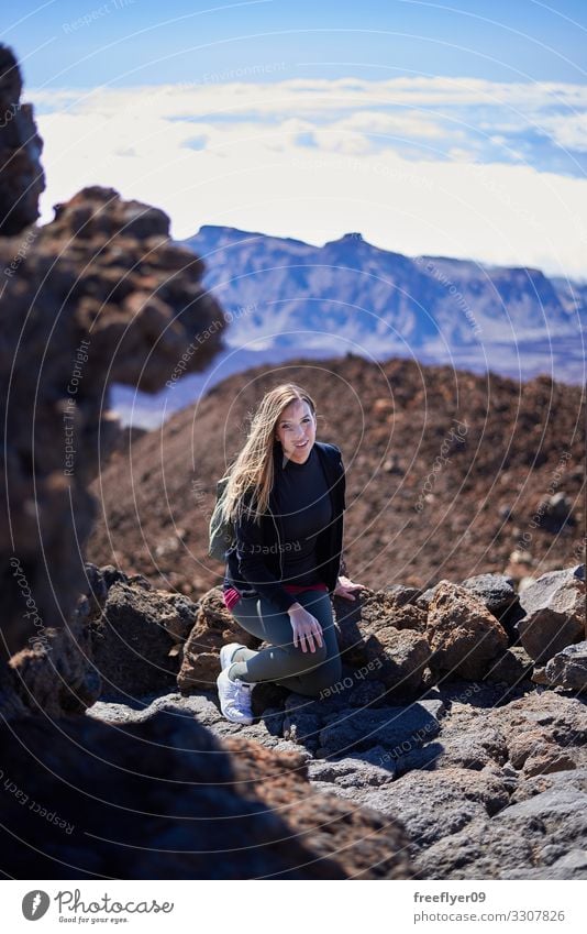 Young woman sitting on the Teide Volcano Beautiful Athletic Relaxation Vacation & Travel Tourism Trip Adventure Freedom Sightseeing Island Mountain Hiking