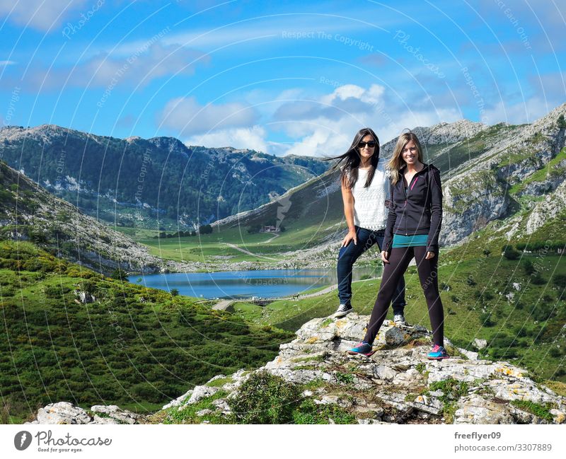 Two friends in front of Covadonga Lagoon Lifestyle Beautiful Tourism Snow Mountain Hiking Sports Young woman Youth (Young adults) Woman Adults Friendship 2